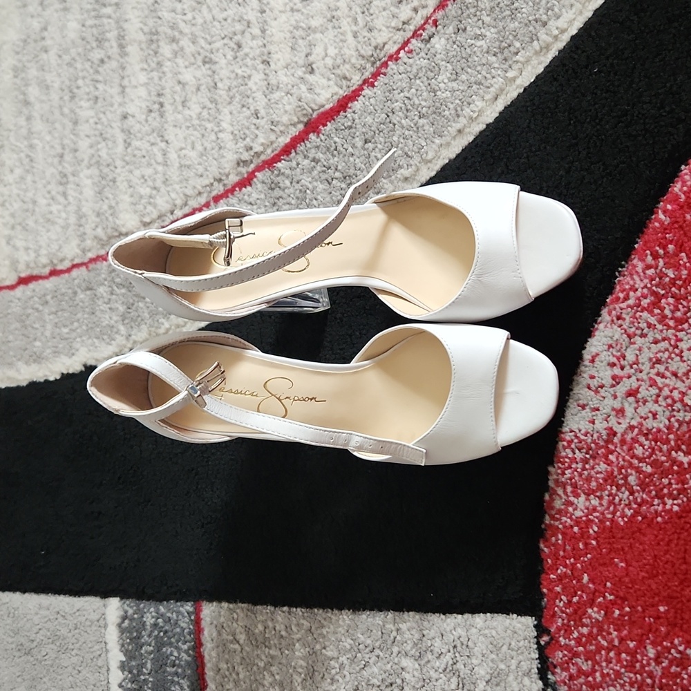 Off white platform pumps with glass heel worn